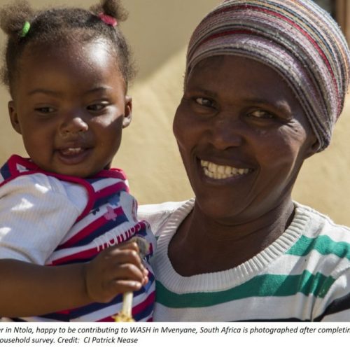 A villager in Ntola is photographed after completing the ABCG WASH household survey. Pcredit CI_Patrick Nease